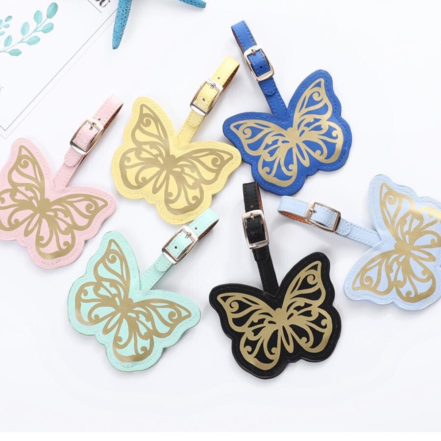 Étiquette Bagage Papillon colorée et élégante, idéale pour vos voyages avec la marque Faci.