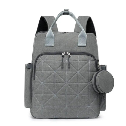 Grand Sac à Dos en tissu oxford, idéal pour changer bébé partout avec ses nombreux compartiments pratiques.